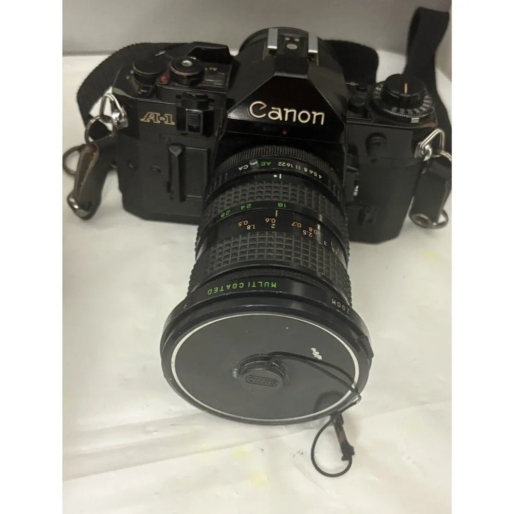 Canon A-1 35mm Film Camera with toyo optics 28mm 1:3.5 Lens and F=28-80  Tested